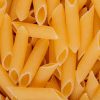 top view of penne pasta as background